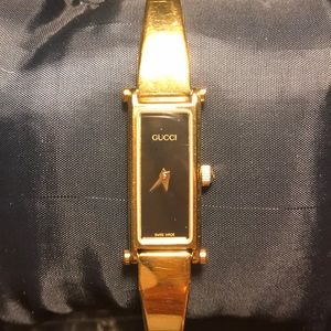 Gucci vintage gold watch